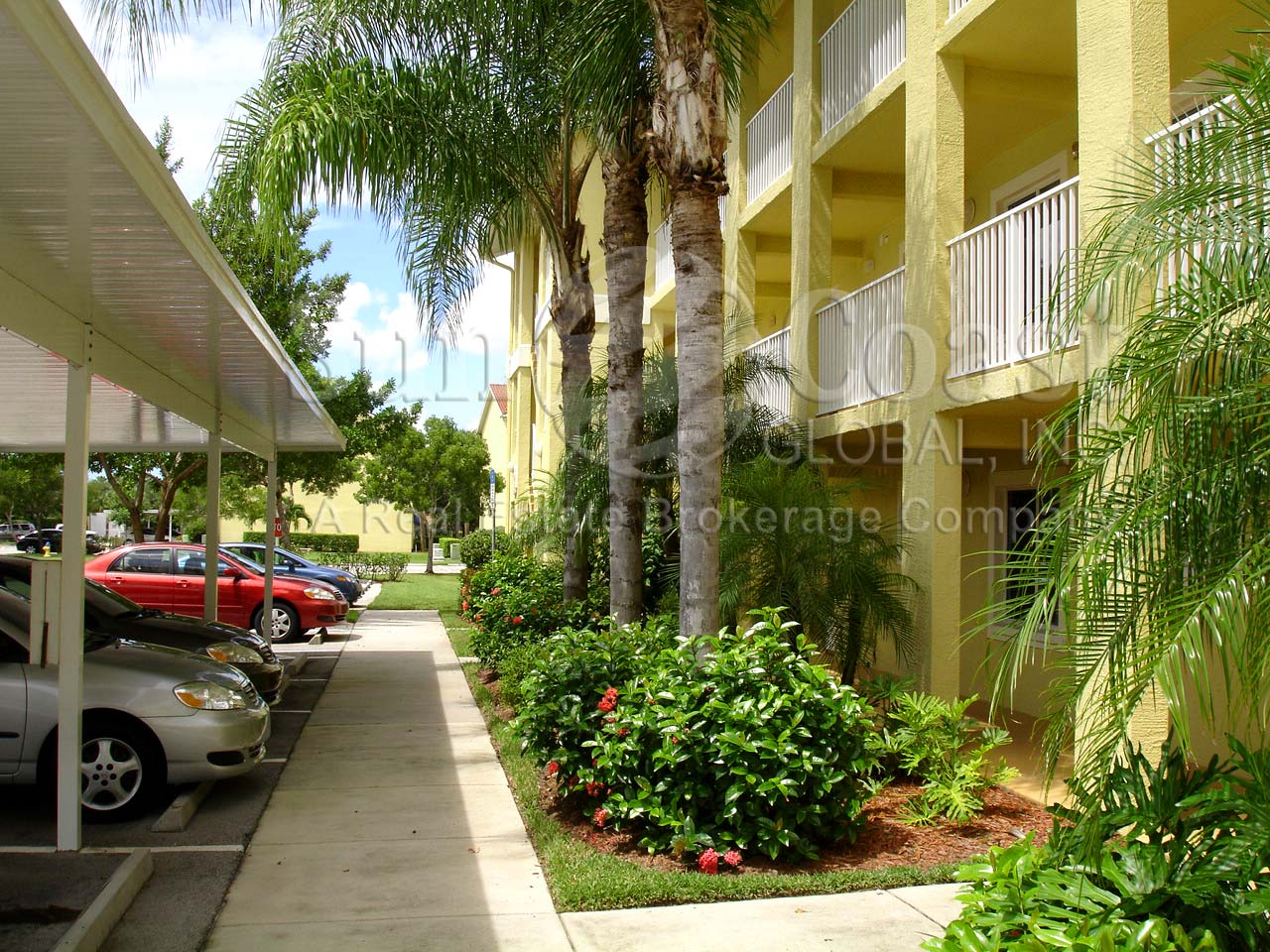 KEY ROYAL Walkway from the Condominiums to the Covered Parking 