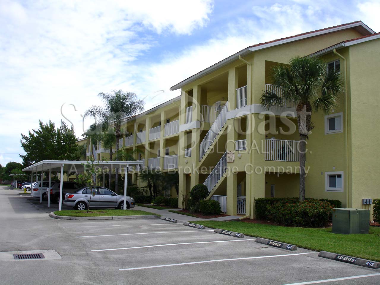 KEY ROYAL Condominium Building with Covered Parking 