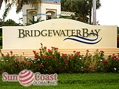 BRIDGEWATER BAY gated entrance with key pad entry and mechanical arm
