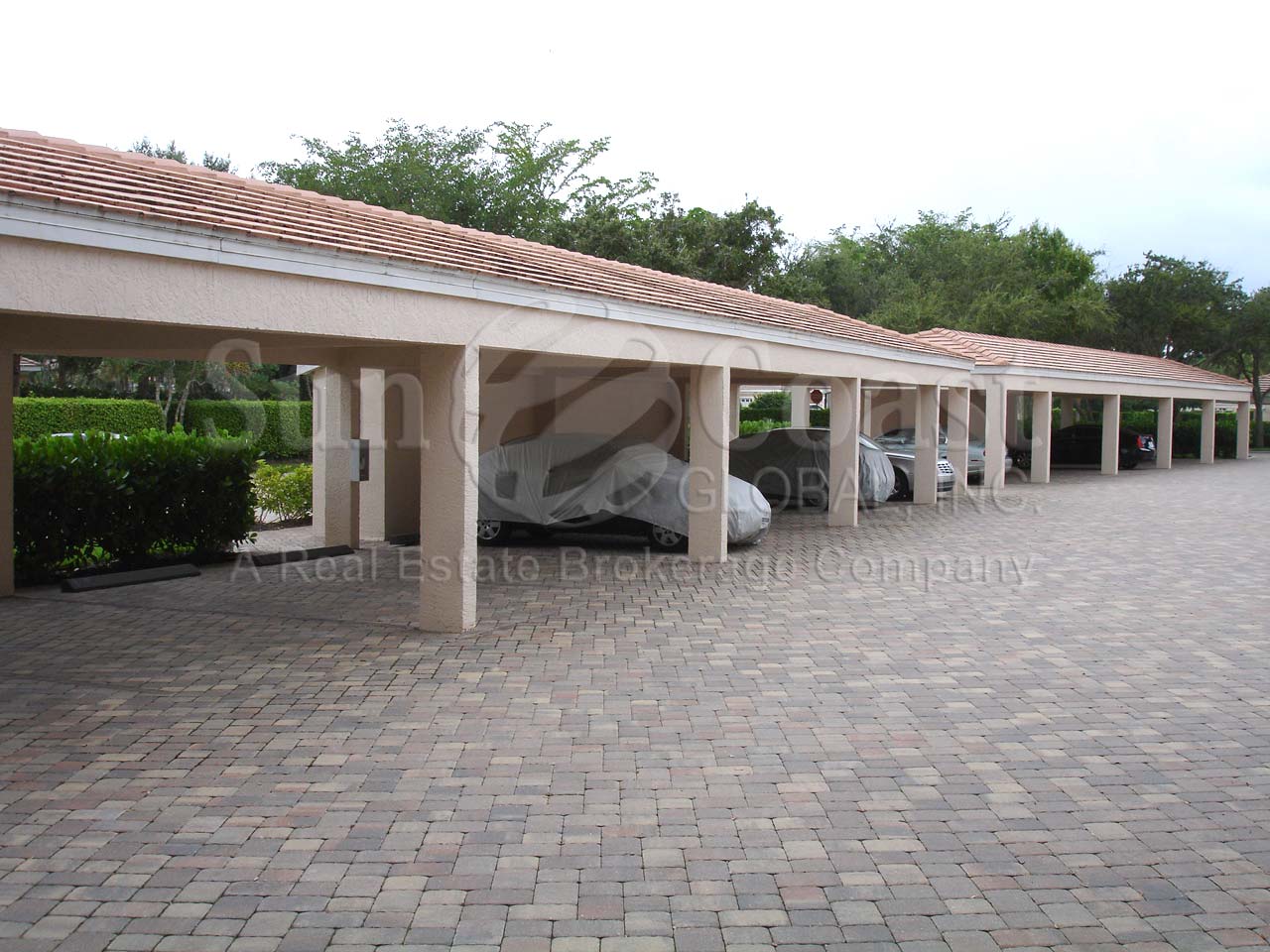 Compass Point South at Windstar car ports with tile roofs