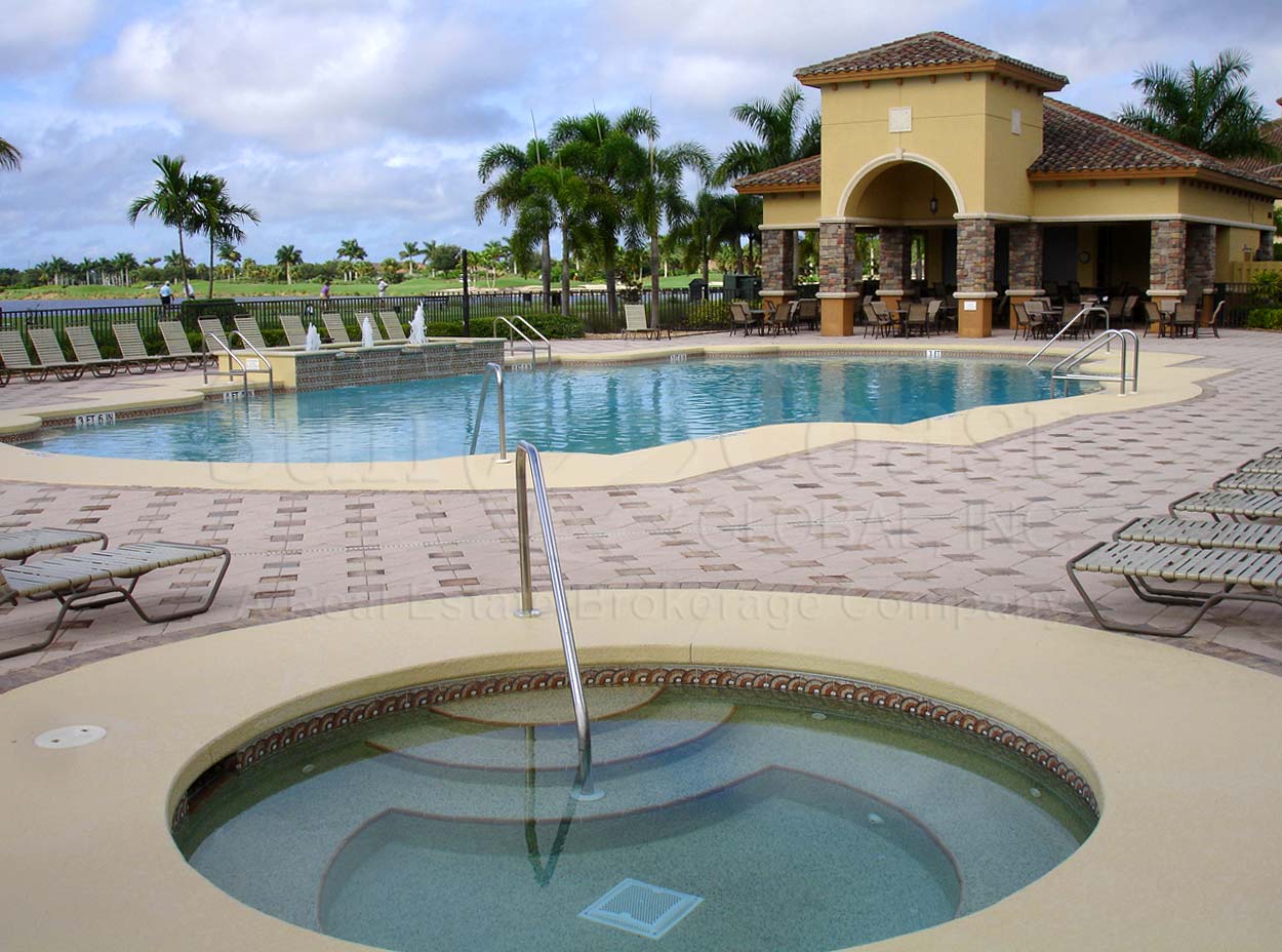 HERITAGE BAY Golf and Country Club fitness center and pool area with hot tub and bar 