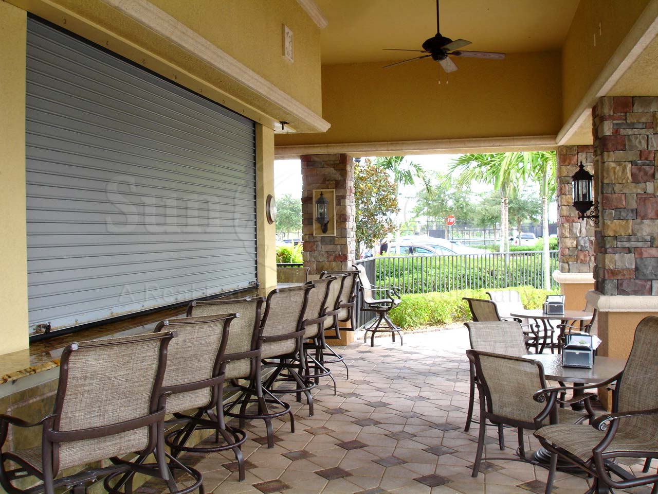 HERITAGE BAY Golf and Country Club pool area and bar