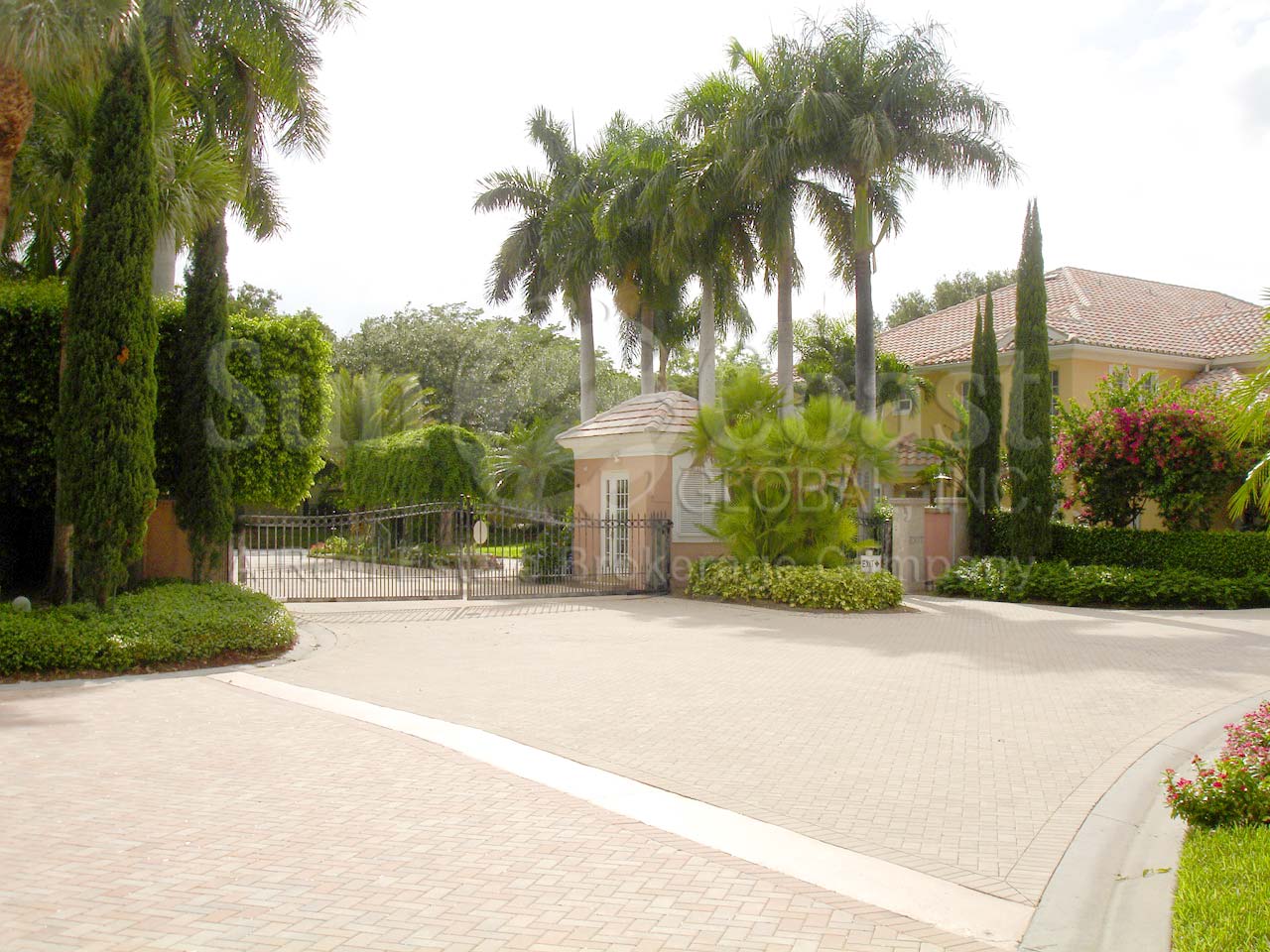Pointe at Pelican Bay gated entry with coded key pad