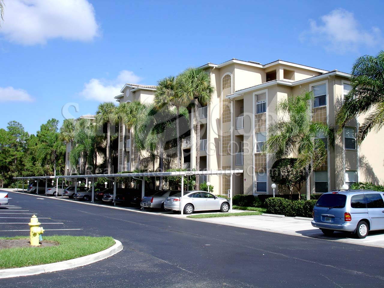 Prestwick is a 4-story condo complex with car ports.