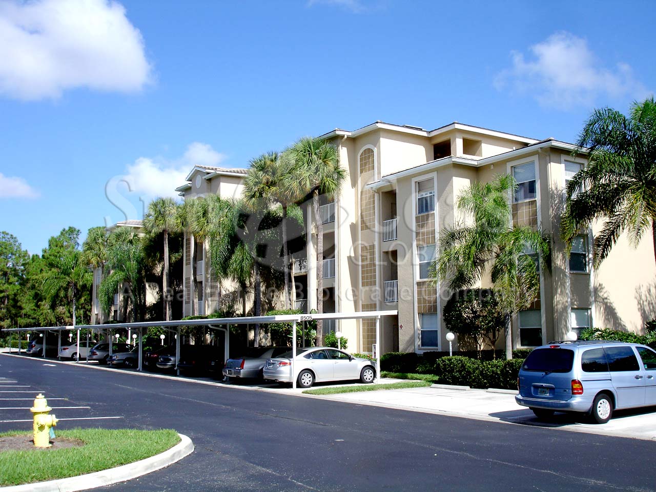 Prestwick is a 4-story condo complex with car ports.