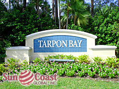 TARPON BAY gated community with key pad entry and metal swing gate