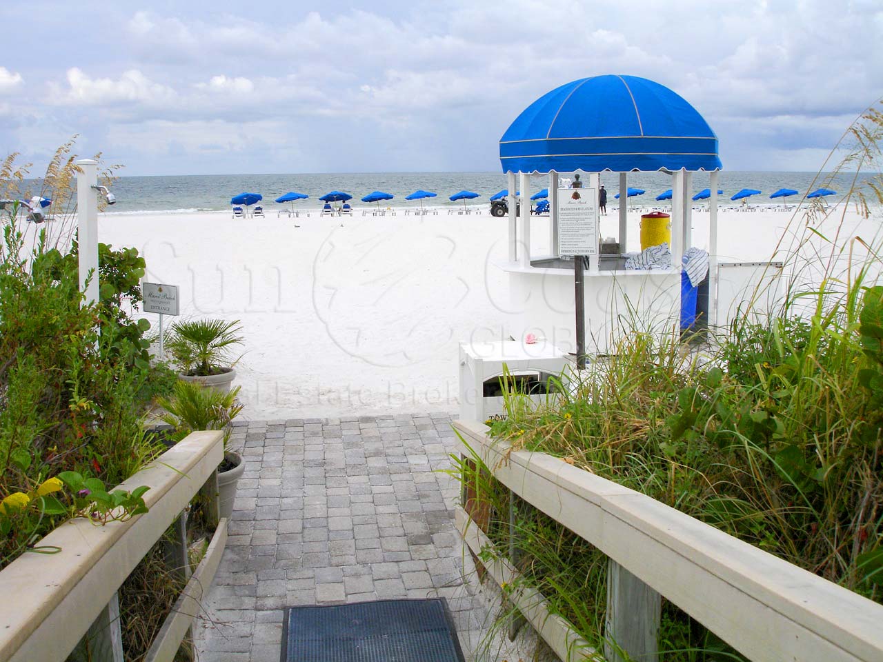 FIDDLERS CREEK Tarpon Club includes beach amenities at the Marco Beach Ocean Resort. Entrance from the walkway to the beach.