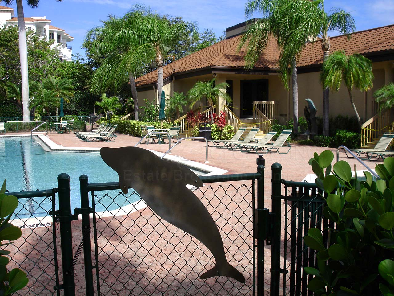 Twin Dolphins Shared Gate to Community Pool with La Peninsula