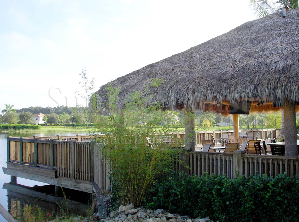 TWIN EAGLES Golf and Country Club pool area tiki hut