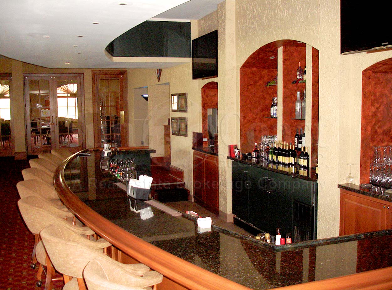 TWIN EAGLES Golf and Country Club bar area and dining