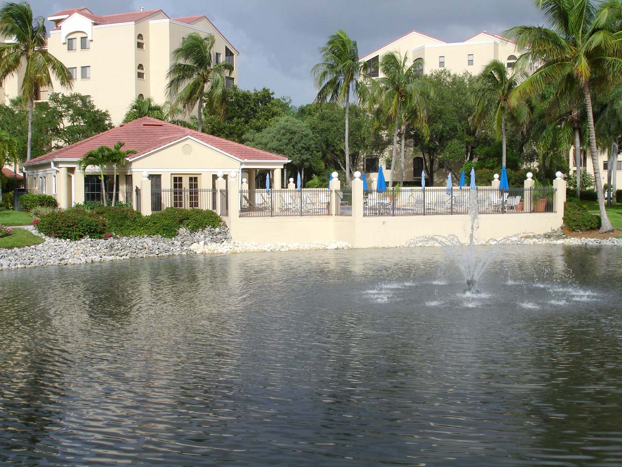 Valencia at Pelican Bay Clubhouse and Pool overlooking the Community Lake