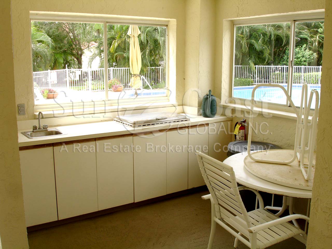 Open clubhouse with no screens, no kitchen facilities, small sink, no airconditioning