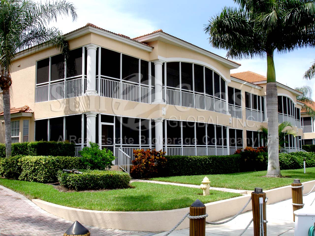 Yacht Harbour Cove are 4-unit condos on the water with 2 car garages and tile roofs.