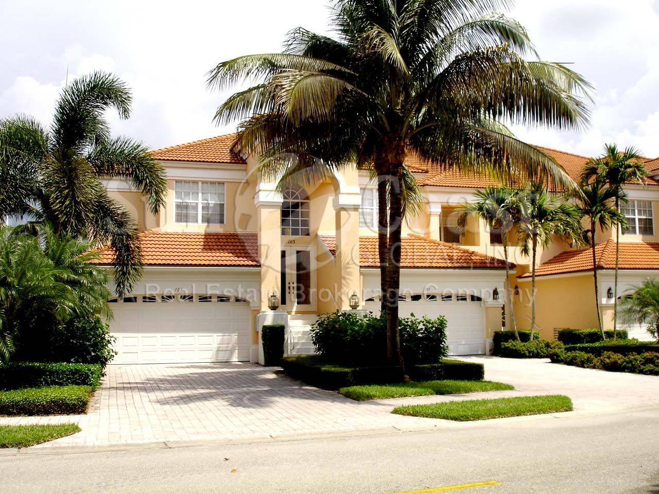 Yacht Harbour Cove are 4-unit condos on the water with 2 car garages and tile roofs.