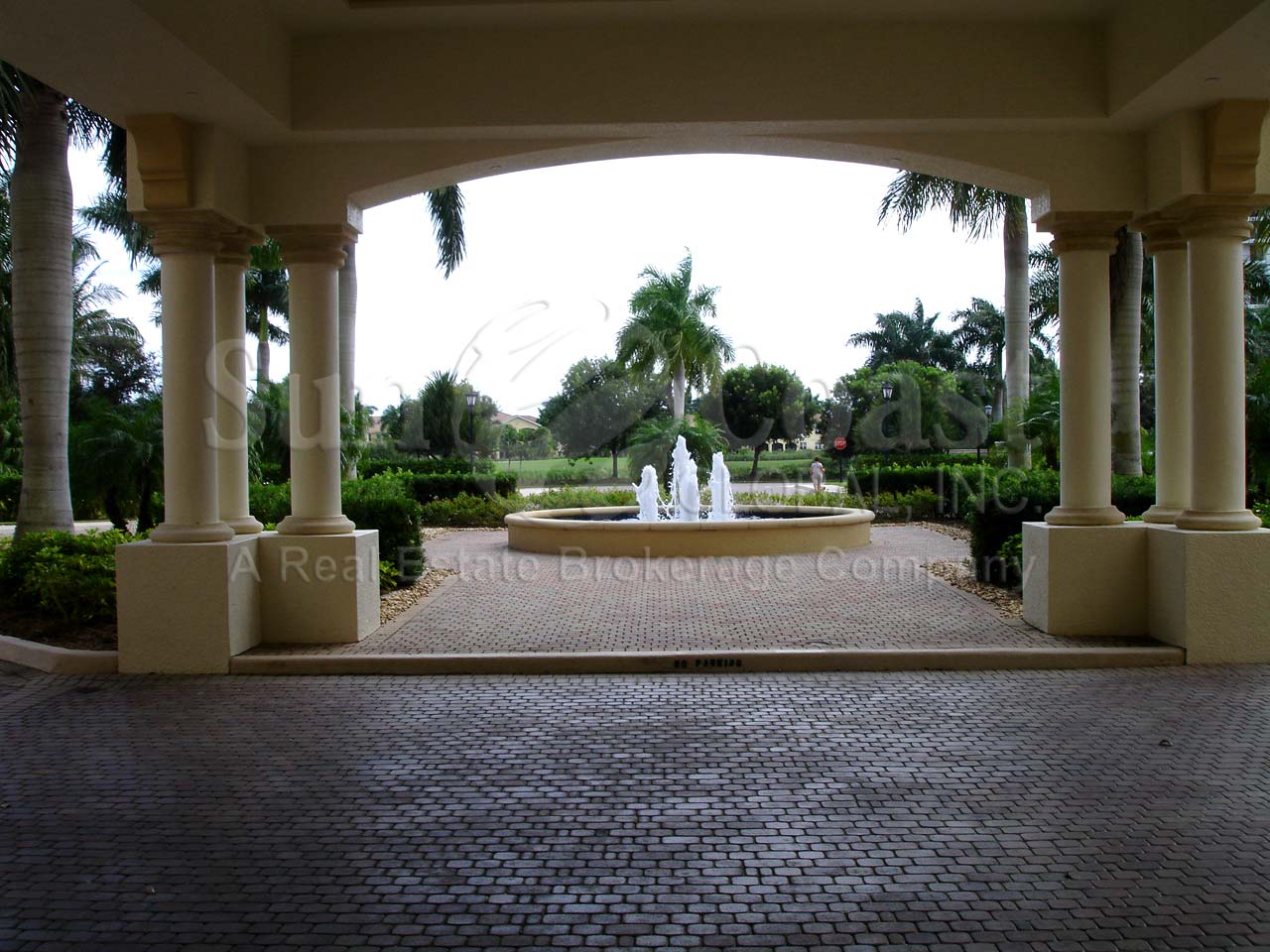 Serano Fountain in front of the Entrance to the Condominium Building