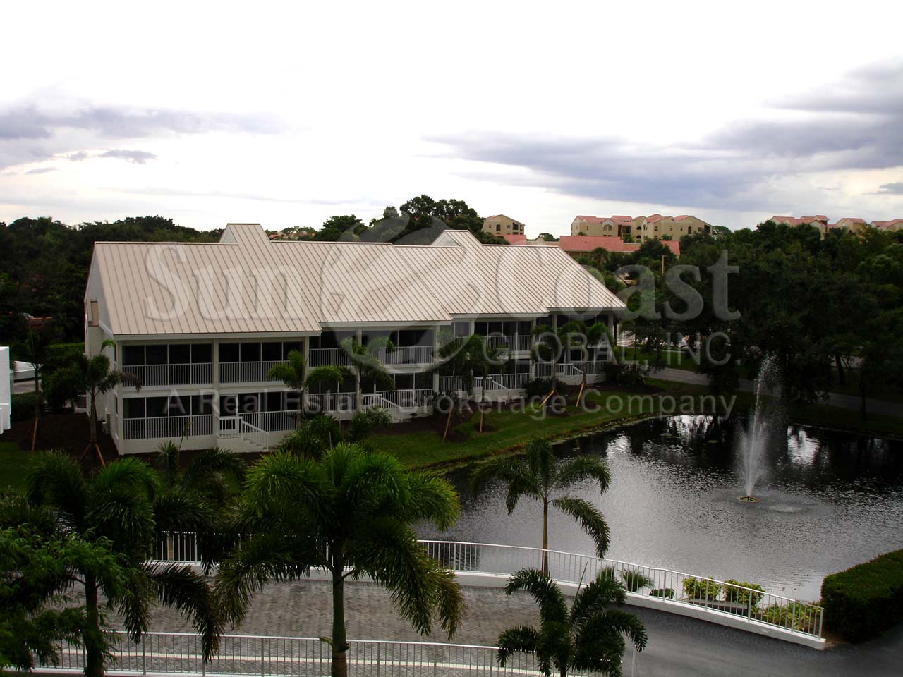 View of the St Lucia Condominiums and Lanais overlooking the Community Lake and Fountain 