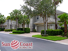  Osprey Pointe 2-story coach homes with pavered drives, tile roofs and 2-car garages